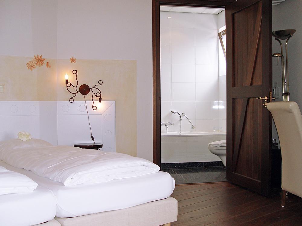 אסטן Hotel Huys Van Heusden מראה חיצוני תמונה